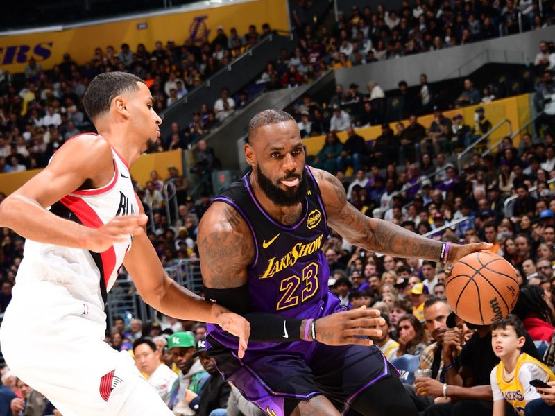 LOS ANGELES, CA - JANUARY 2: LeBron James #23 of the Los Angeles Lakers dribbles the ball during the game against the Portland Trail Blazers on January 2, 2025 at Crypto.Com Arena in Los Angeles, California. NOTE TO USER: User expressly acknowledges and agrees that, by downloading and/or using this Photograph, user is consenting to the terms and conditions of the Getty Images License Agreement. Mandatory Copyright Notice: Copyright 2025 NBAE (Photo by Adam Pantozzi/NBAE via Getty Images)