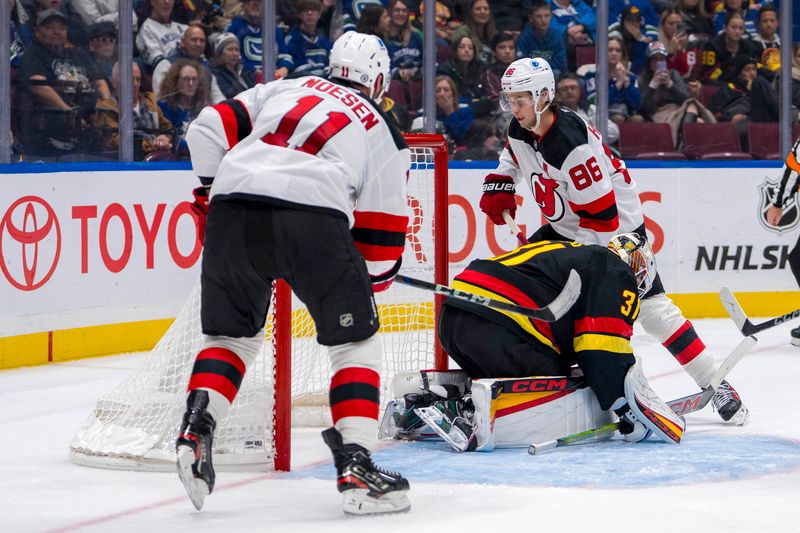 Canucks Set to Tangle with Devils: A Strategic Duel in Newark