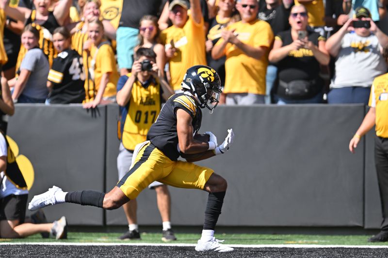 Sep 2, 2023; Iowa City, Iowa, USA; Iowa Hawkeyes wide receiver Seth Anderson (6) catches a 36 yard touchdown pass during the first quarter against the Utah State Aggies at Kinnick Stadium. Mandatory Credit: Jeffrey Becker-USA TODAY Sports