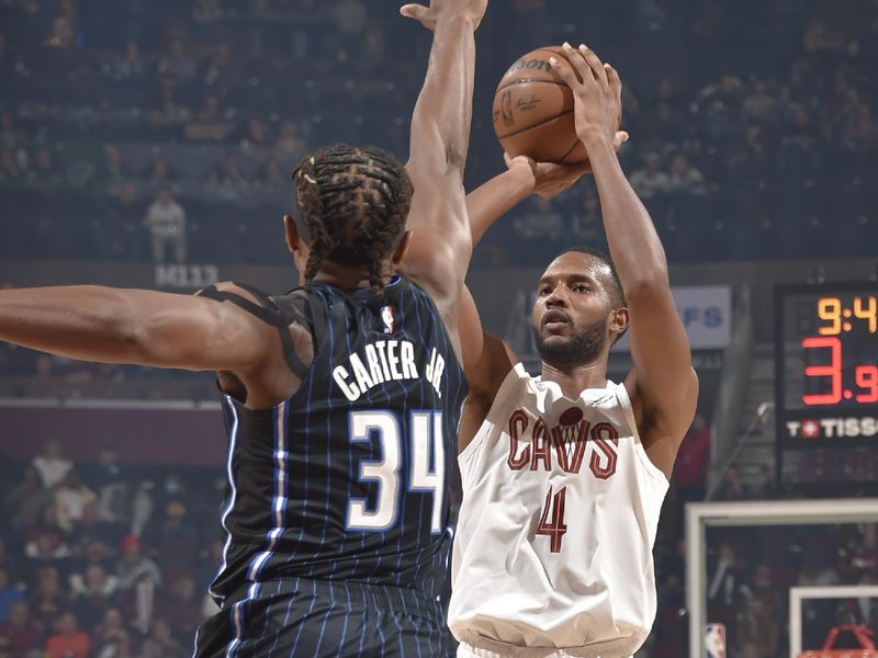 CLEVELAND, OH - FEBRUARY 22: Evan Mobley #4 of the Cleveland Cavaliers shoots the ball during the game against the Orlando Magic on February 22, 2024 at Rocket Mortgage FieldHouse in Cleveland, Ohio. NOTE TO USER: User expressly acknowledges and agrees that, by downloading and/or using this Photograph, user is consenting to the terms and conditions of the Getty Images License Agreement. Mandatory Copyright Notice: Copyright 2024 NBAE (Photo by David Liam Kyle/NBAE via Getty Images)