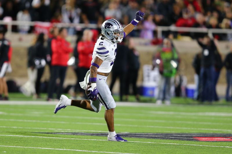 Oct 14, 2023; Lubbock, Texas, USA;  Kansas State Wildcats defensive safety Kobe Savage (2) reacts after intercepting a pass against the Texas Tech Red Raiders in the second half at Jones AT&T Stadium and Cody Campbell Field. Mandatory Credit: Michael C. Johnson-USA TODAY Sports