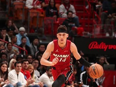 MIAMI, FL - DECEMBER 25:  Tyler Herro #14 of the Miami Heat handles the ball during the game  on December 25, 2023 at Kaseya Center Arena in Miami, Florida. NOTE TO USER: User expressly acknowledges and agrees that, by downloading and or using this Photograph, user is consenting to the terms and conditions of the Getty Images License Agreement. Mandatory Copyright Notice: Copyright 2023 NBAE (Photo by Issac Baldizon/NBAE via Getty Images)