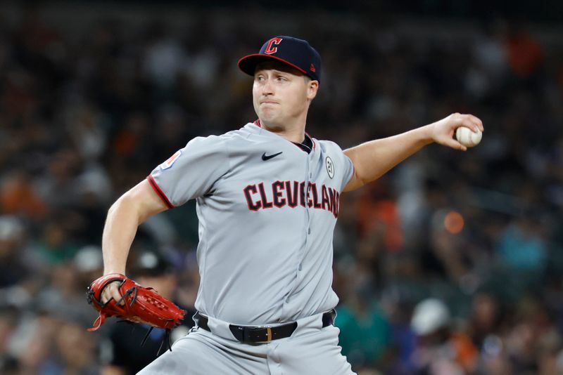 Sep 16, 2025; Detroit, Michigan, USA; Cleveland Guardians pitcher Tim Herrin (29) pitches in the eighth inning against the Detroit Tigers at Comerica Park. Mandatory Credit: Rick Osentoski-Imagn Images