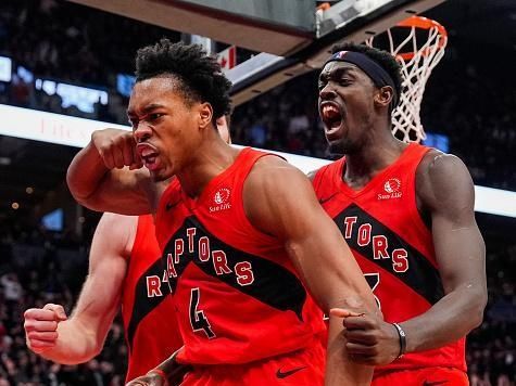 TORONTO, ON - DECEMBER 13: Scottie Barnes #4 of the Toronto Raptors celebrates with teammate Pascal Siakam #43 after making a basket against the Atlanta Hawks during second half NBA action at Scotiabank Arena on December 13, 2023 in Toronto, Ontario, Canada. NOTE TO USER: User expressly acknowledges and agrees that, by downloading and/or using this Photograph, user is consenting to the terms and conditions of the Getty Images License Agreement. (Photo by Andrew Lahodynskyj/Getty Images)