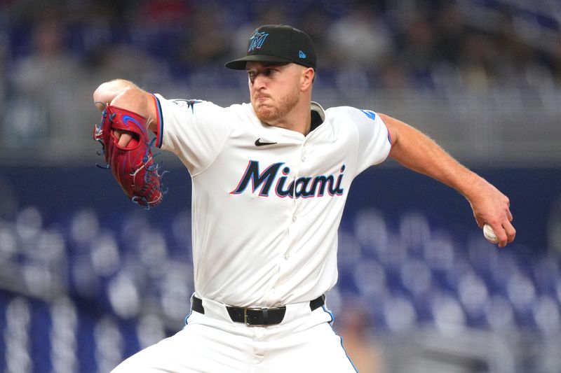 May 21, 2024; Miami, Florida, USA;  Miami Marlins starting pitcher Trevor Rogers (28) pitches in the first inning against the Milwaukee Brewers at loanDepot Park. Mandatory Credit: Jim Rassol-USA TODAY Sports