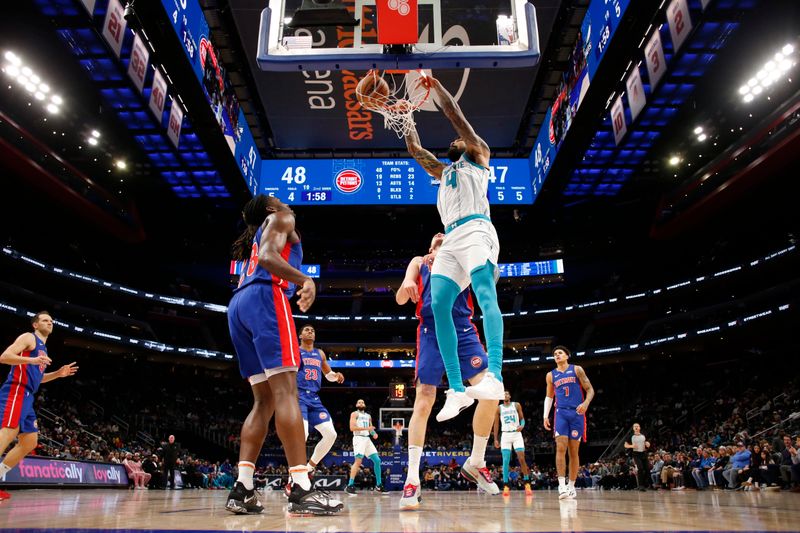 DETROIT, MI - JANUARY 24: Nick Richards #4 of the Charlotte Hornets drives to the basket during the game against the Detroit Pistons on January 24, 2024 at Little Caesars Arena in Detroit, Michigan. NOTE TO USER: User expressly acknowledges and agrees that, by downloading and/or using this photograph, User is consenting to the terms and conditions of the Getty Images License Agreement. Mandatory Copyright Notice: Copyright 2024 NBAE (Photo by Brian Sevald/NBAE via Getty Images)