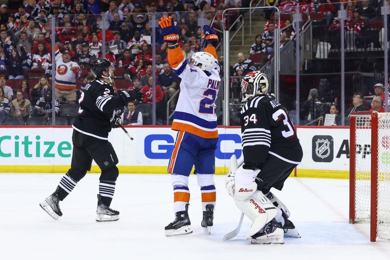 Apr 15, 2024; Newark, New Jersey, USA; New York Islanders center Kyle Palmieri (21) celebrates his goal against the New Jersey Devils during the first period at Prudential Center. Mandatory Credit: Ed Mulholland-USA TODAY Sports