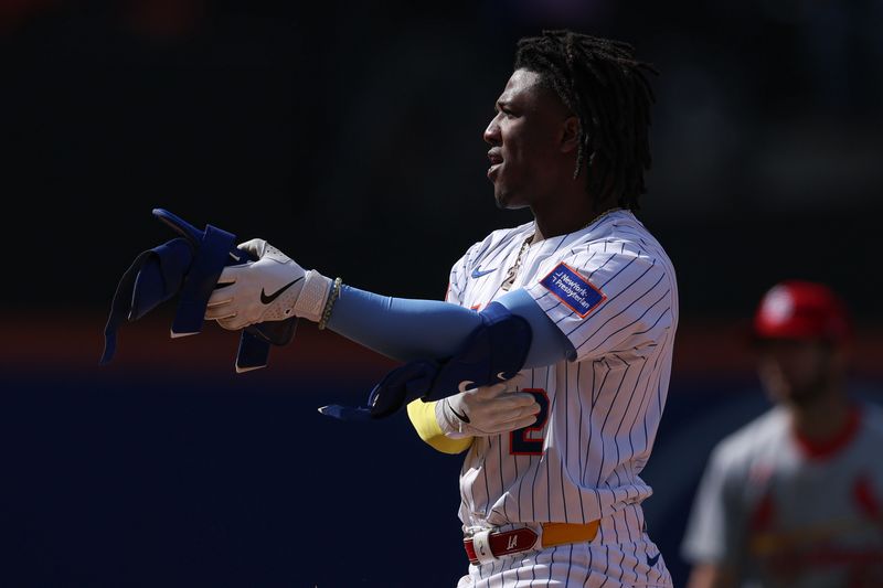 Apr 20, 2025; New York City, New York, USA; New York Mets shortstop Luisangel Acuna (2) reacts after hitting a double during the eighth inning against the St. Louis Cardinals at Citi Field. Mandatory Credit: Vincent Carchietta-Imagn Images