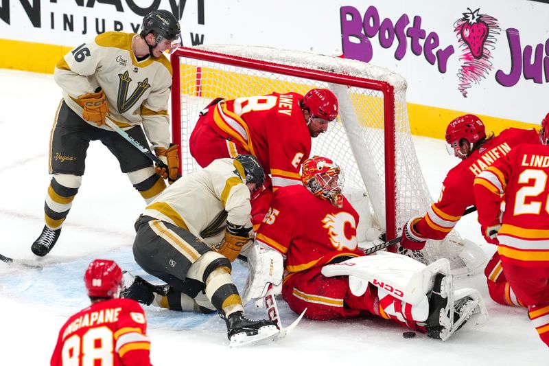 Jan 13, 2024; Las Vegas, Nevada, USA; Calgary Flames goaltender Jacob Markstrom (25) attempts to cover the puck under Vegas Golden Knights pressure during the third period at T-Mobile Arena. Mandatory Credit: Stephen R. Sylvanie-USA TODAY Sports