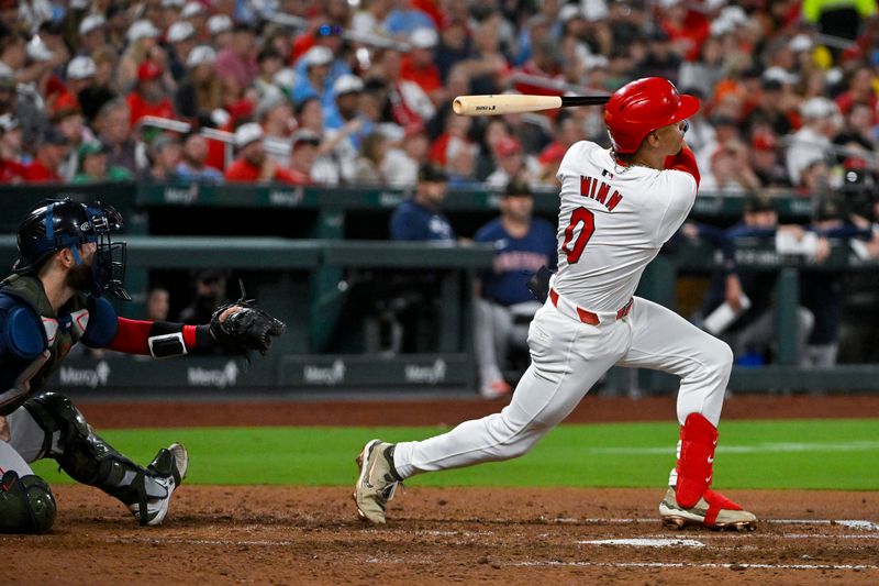 May 17, 2024; St. Louis, Missouri, USA;  St. Louis Cardinals shortstop Masyn Winn (0) hits a two run home run against the Boston Red Sox during the sixth inning at Busch Stadium. Mandatory Credit: Jeff Curry-USA TODAY Sports