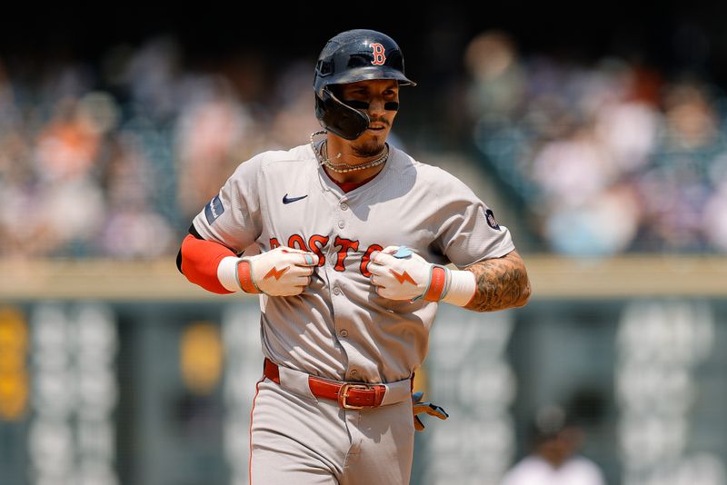 Jul 24, 2024; Denver, Colorado, USA; Boston Red Sox left fielder Jarren Duran (16) reacts as he rounds the bases on a solo home run in the fifth inning against the Colorado Rockies at Coors Field. Mandatory Credit: Isaiah J. Downing-USA TODAY Sports