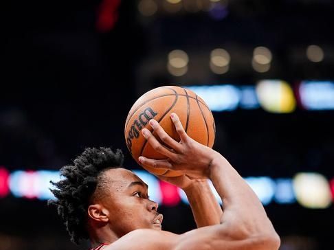 TORONTO, ON - DECEMBER 23: Scottie Barnes #4 of the Toronto Raptors shoots against the Utah Jazz during the first half of their basketball game at the Scotiabank Arena on December 23, 2023 in Toronto, Ontario, Canada. NOTE TO USER: User expressly acknowledges and agrees that, by downloading and/or using this Photograph, user is consenting to the terms and conditions of the Getty Images License Agreement. (Photo by Mark Blinch/Getty Images)