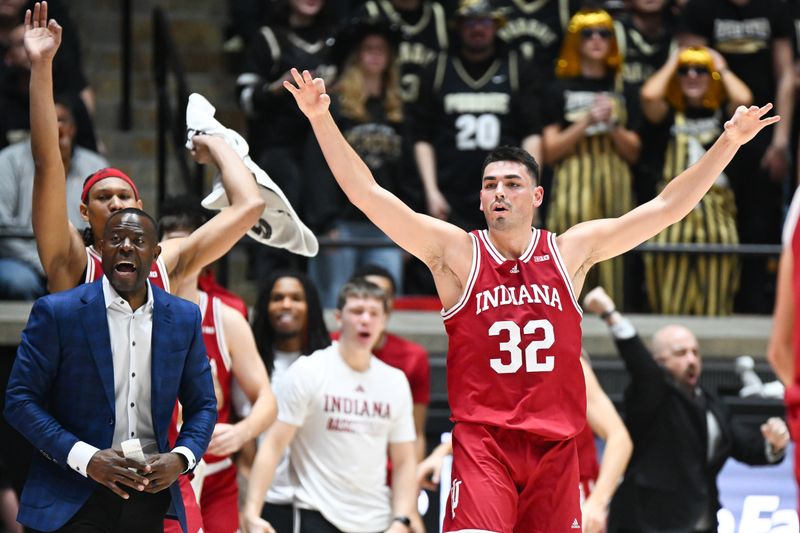 Jan 31, 2025; West Lafayette, Indiana, USA; Indiana Hoosiers guard Trey Galloway (32) celebrates during a timeout during the first half against the Purdue Boilermakers at Mackey Arena. Mandatory Credit: Robert Goddin-Imagn Images