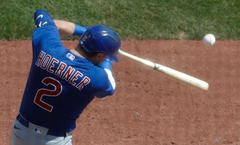 Aug 27, 2023; Pittsburgh, Pennsylvania, USA;  Chicago Cubs second baseman Nico Hoerner (2) hits a single against the Pittsburgh Pirates during the fifth inning at PNC Park. Mandatory Credit: Charles LeClaire-USA TODAY Sports