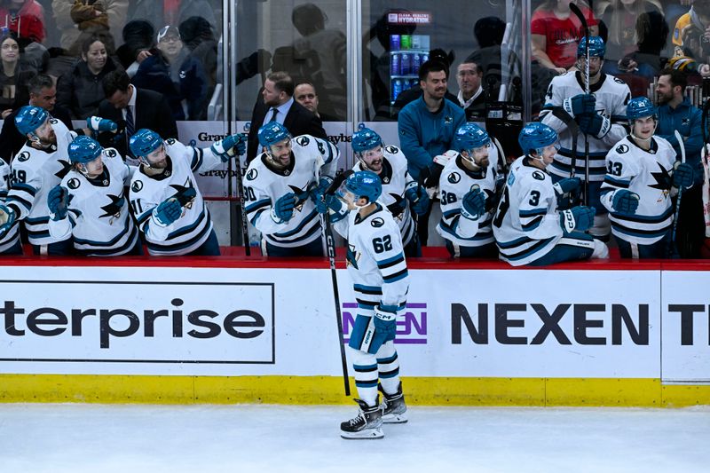 Jan 16, 2024; Chicago, Illinois, USA; San Jose Sharks right wing Kevin Labanc (62) celebrates with teammates after he scored past Chicago Blackhawks goaltender Petr Mrazek (34) during the overtime period at United Center. Mandatory Credit: Matt Marton-USA TODAY Sports