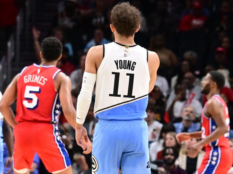 ATLANTA, GA - MARCH 23: Trae Young #11 of the Atlanta Hawks looks on during the game against the Philadelphia 76ers on March 23, 2025 at State Farm Arena in Atlanta, Georgia.  NOTE TO USER: User expressly acknowledges and agrees that, by downloading and/or using this Photograph, user is consenting to the terms and conditions of the Getty Images License Agreement. Mandatory Copyright Notice: Copyright 2025 NBAE (Photo by Adam Hagy/NBAE via Getty Images)
