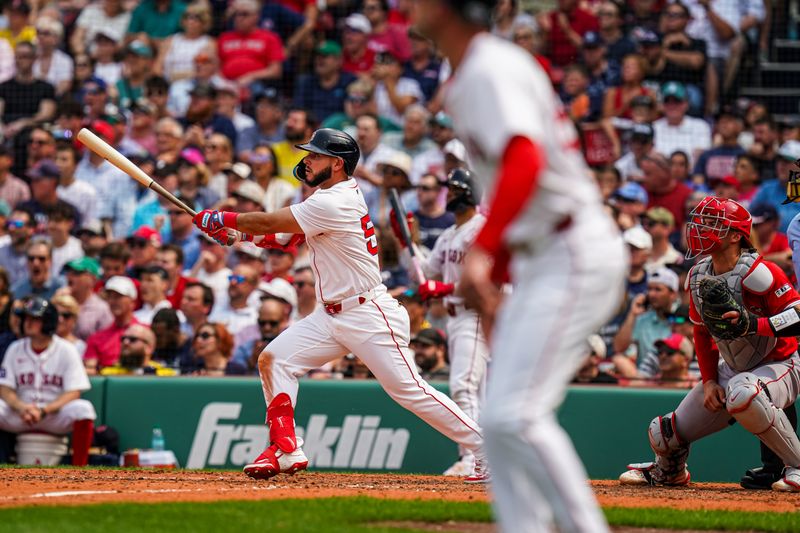 Jun 4, 2025; Boston, Massachusetts, USA; Boston Red Sox outfielder Wilyer Abreu (52) hits a sacrifice out to drive in a run against the Los Angeles Angels in the fourth inning at Fenway Park. Mandatory Credit: David Butler II-Imagn Images