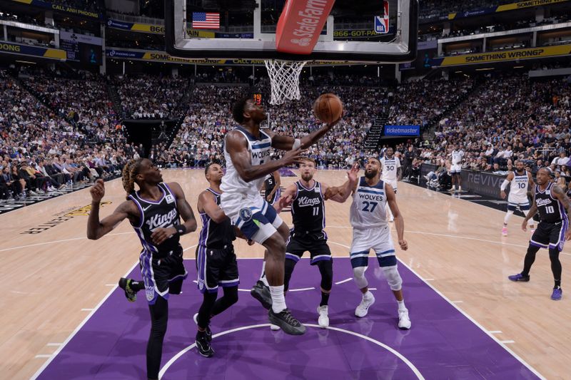 SACRAMENTO, CA - OCTOBER 24: Anthony Edwards #5 of the Minnesota Timberwolves drives to the basket during the game against the Sacramento Kings on October 24, 2024 at Golden 1 Center in Sacramento, California. NOTE TO USER: User expressly acknowledges and agrees that, by downloading and or using this Photograph, user is consenting to the terms and conditions of the Getty Images License Agreement. Mandatory Copyright Notice: Copyright 2024 NBAE (Photo by Rocky Widner/NBAE via Getty Images)