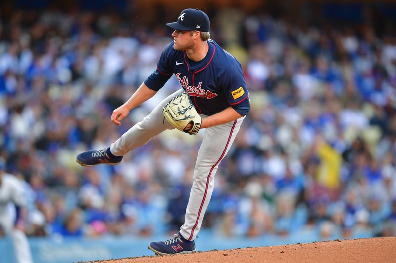 May 4, 2024; Los Angeles, California, USA; Atlanta Braves pitcher Bryce Elder (55) throws against the Los Angeles Dodgers during the second inning at Dodger Stadium. Mandatory Credit: Gary A. Vasquez-USA TODAY Sports