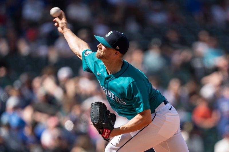 May 15, 2024; Seattle, Washington, USA; Seattle Mariners reliever Austin Voth (30) delivers a pitch during the eighth inning against the Kansas City Royals at T-Mobile Park. Mandatory Credit: Stephen Brashear-USA TODAY Sports