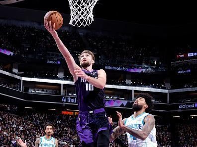 SACRAMENTO, CA - JANUARY 2: Domantas Sabonis #10 of the Sacramento Kings drives to the basket during the game against the Charlotte Hornets on January 2, 2024 at Golden 1 Center in Sacramento, California. NOTE TO USER: User expressly acknowledges and agrees that, by downloading and or using this Photograph, user is consenting to the terms and conditions of the Getty Images License Agreement. Mandatory Copyright Notice: Copyright 2024 NBAE (Photo by Rocky Widner/NBAE via Getty Images)