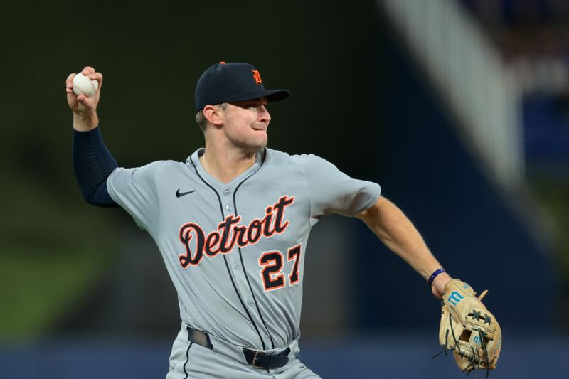 Sep 12, 2025; Miami, Florida, USA; Detroit Tigers shortstop Trey Sweeney (27) throws to first base to retire Miami Marlins catcher Agustin Ramirez (not pictured) during the fifth inning at loanDepot Park. Mandatory Credit: Sam Navarro-Imagn Images