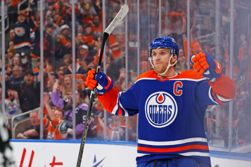 Jan 27, 2024; Edmonton, Alberta, CAN; Edmonton Oilers forward Connor McDavid (97) celebrates after scoring a goal during the third period against the Nashville Predators at Rogers Place. Mandatory Credit: Perry Nelson-USA TODAY Sports