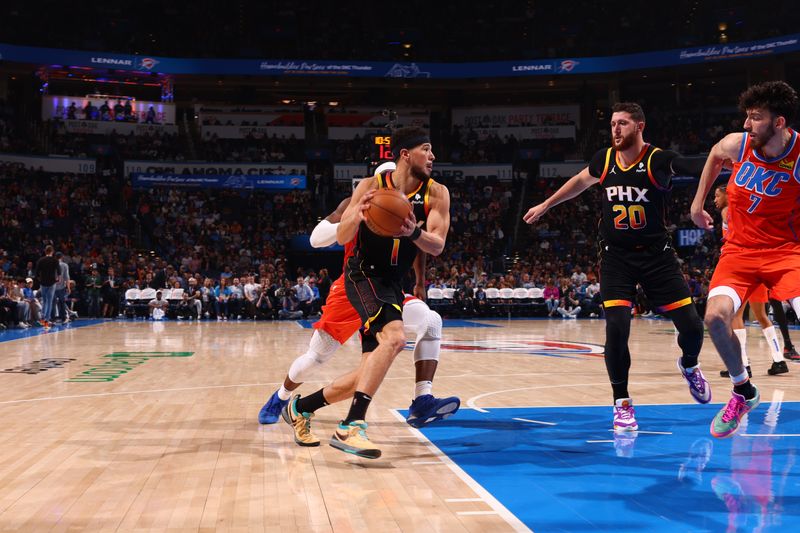 OKLAHOMA CITY, OK - MARCH 29: Devin Booker #1 of the Phoenix Suns handles the ball during the game against the Oklahoma City Thunder on March 29, 2024 at Paycom Arena in Oklahoma City, Oklahoma. NOTE TO USER: User expressly acknowledges and agrees that, by downloading and or using this photograph, User is consenting to the terms and conditions of the Getty Images License Agreement. Mandatory Copyright Notice: Copyright 2024 NBAE (Photo by Zach Beeker/NBAE via Getty Images)