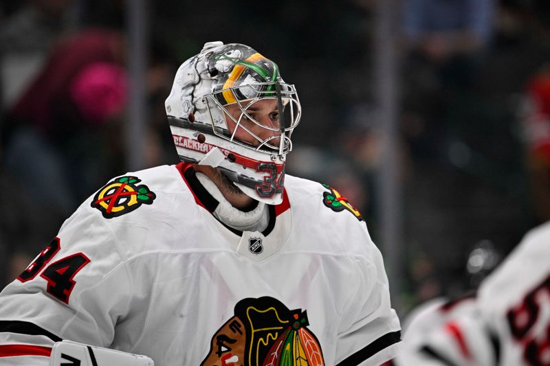 Oct 26, 2024; Dallas, Texas, USA; Chicago Blackhawks goaltender Petr Mrazek (34) looks on during the face-off in the second period against the Dallas Stars at the American Airlines Center. Mandatory Credit: Jerome Miron-Imagn Images