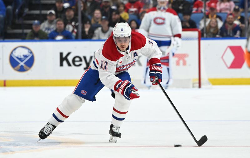 Nov 11, 2024; Buffalo, New York, USA; Montreal Canadiens right wing Brendan Gallagher (11) skates with the puck against the Buffalo Sabres in the first period at KeyBank Center. Mandatory Credit: Mark Konezny-Imagn Images