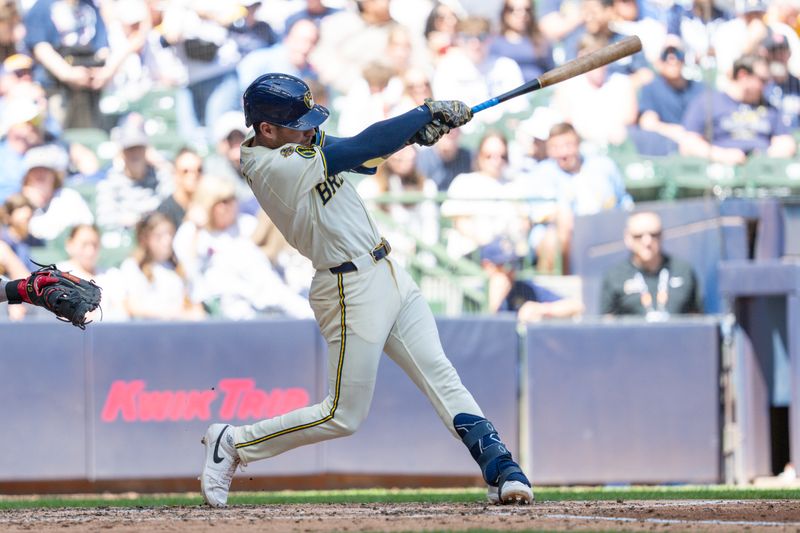 May 26, 2025; Milwaukee, Wisconsin, USA;  Milwaukee Brewers shortstop Joey Ortiz (3) doubles during the fifth inning against the Boston Red Sox at American Family Field. Mandatory Credit: Jeff Hanisch-Imagn Images