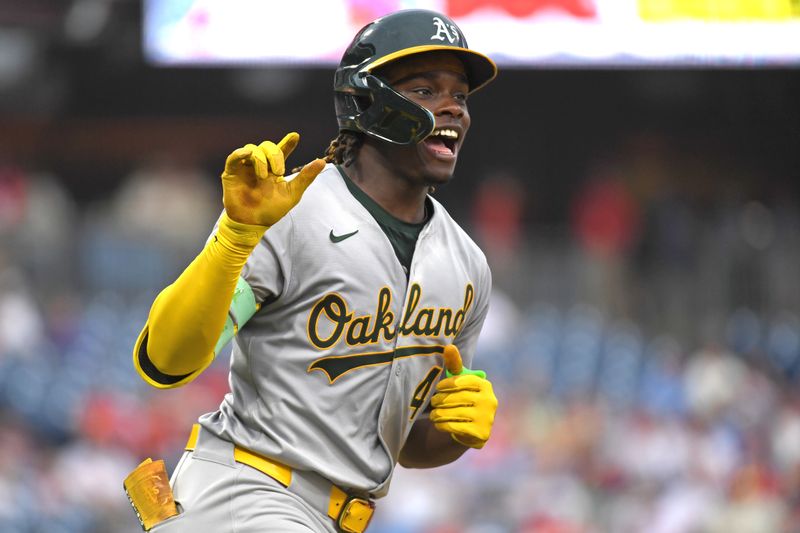Jul 14, 2024; Philadelphia, Pennsylvania, USA; Oakland Athletics outfielder Lawrence Butler (4) celebrates his third home run of the game against the Philadelphia Phillies during the seventh inning at Citizens Bank Park. Mandatory Credit: Eric Hartline-USA TODAY Sports