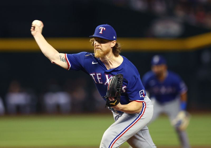 Aug 22, 2023; Phoenix, Arizona, USA; Texas Rangers pitcher Jon Gray against the Arizona Diamondbacks in the first inning at Chase Field. Mandatory Credit: Mark J. Rebilas-USA TODAY Sports