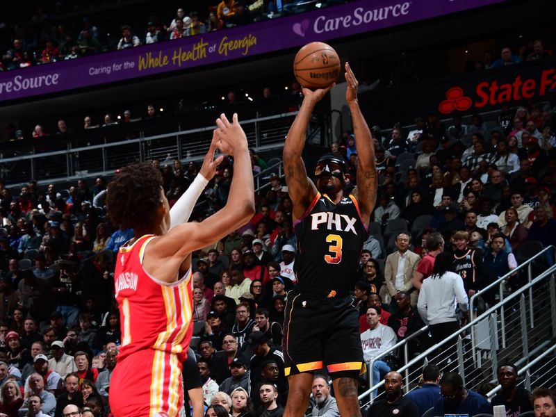 ATLANTA, GA - FEBRUARY 2: Bradley Beal #3 of the Phoenix Suns shoots a three point basket against the Atlanta Hawks on February 2, 2024 at State Farm Arena in Atlanta, Georgia.  NOTE TO USER: User expressly acknowledges and agrees that, by downloading and/or using this Photograph, user is consenting to the terms and conditions of the Getty Images License Agreement. Mandatory Copyright Notice: Copyright 2024 NBAE (Photo by Scott Cunningham/NBAE via Getty Images)