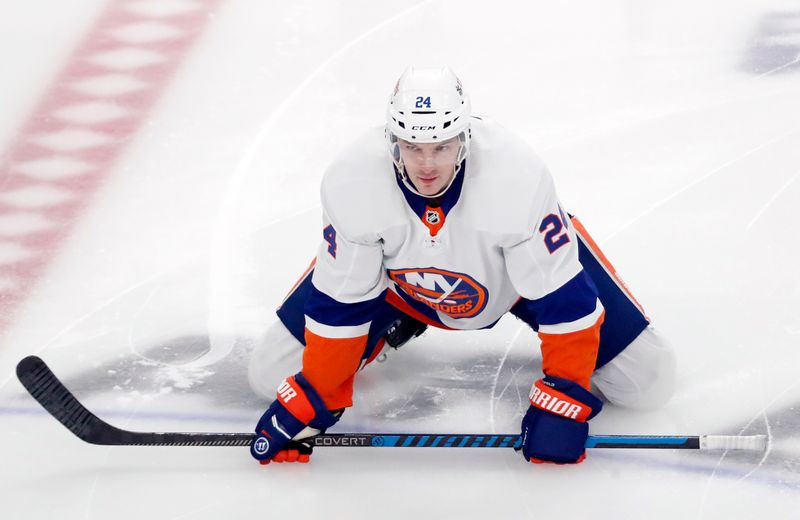 Feb 20, 2024; Pittsburgh, Pennsylvania, USA; New York Islanders defenseman Scott Mayfield (24) warms up before the game against the Pittsburgh Penguins at PPG Paints Arena. Mandatory Credit: Charles LeClaire-USA TODAY Sports