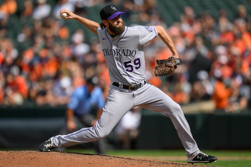 Aug 27, 2023; Baltimore, Maryland, USA; Colorado Rockies relief pitcher Jake Bird (59) throws a pitch during the eighth inning against the Baltimore Orioles at Oriole Park at Camden Yards. Mandatory Credit: Reggie Hildred-USA TODAY Sports