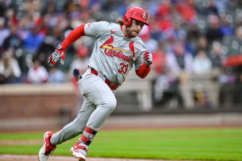 Apr 27, 2024; New York City, New York, USA; St. Louis Cardinals outfielder Brendan Donovan (33) hits a double during the fourth inning against the New York Mets at Citi Field. Mandatory Credit: John Jones-USA TODAY Sports