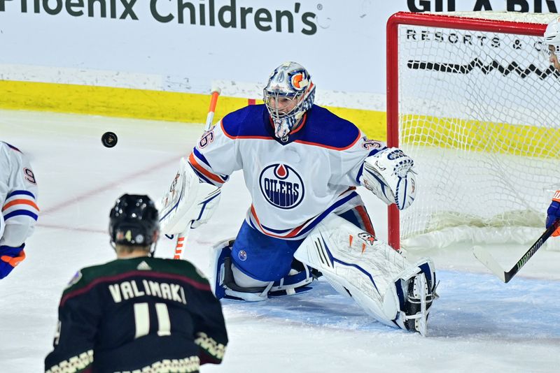 Mar 27, 2023; Tempe, Arizona, USA;  Edmonton Oilers goaltender Jack Campbell (36) watches a rebounding puck in the first period against the Arizona Coyotes at Mullett Arena. Mandatory Credit: Matt Kartozian-USA TODAY Sports