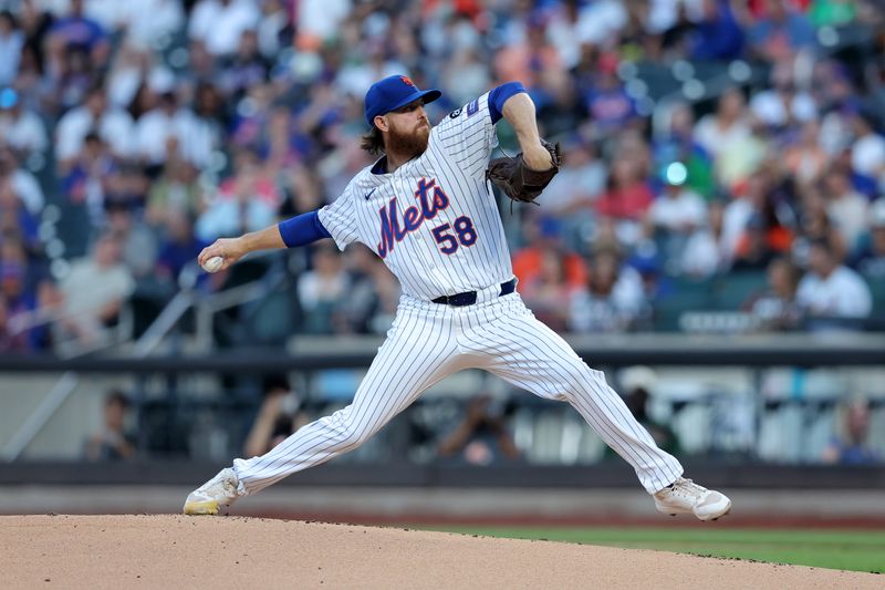 Aug 13, 2024; New York City, New York, USA; New York Mets starting pitcher Paul Blackburn (58) pitches against the Oakland Athletics during the first inning at Citi Field. Mandatory Credit: Brad Penner-USA TODAY Sports