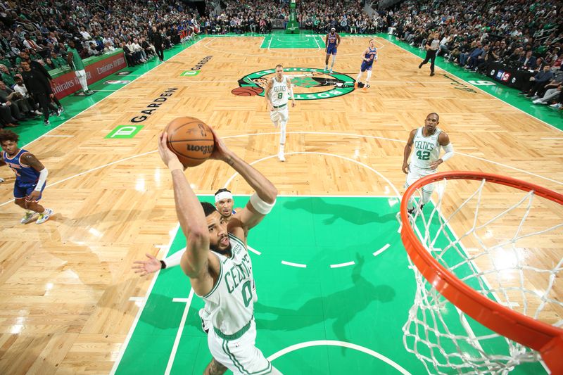 BOSTON, MA - APRIL 11: Jayson Tatum #0 of the Boston Celtics dunks the ball during the game against the New York Knicks on April 11, 2024 at the TD Garden in Boston, Massachusetts. NOTE TO USER: User expressly acknowledges and agrees that, by downloading and or using this photograph, User is consenting to the terms and conditions of the Getty Images License Agreement. Mandatory Copyright Notice: Copyright 2024 NBAE  (Photo by Nathaniel S. Butler/NBAE via Getty Images)