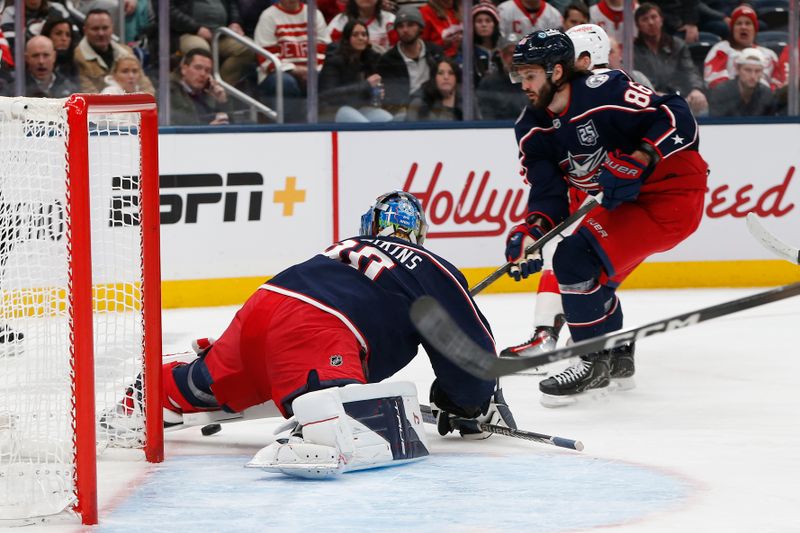 Dec 4, 2025; Columbus, Ohio, USA; Columbus Blue Jackets goalie Elvis Merzlikins (90) makes a save against the Detroit Red Wings during the first period at Nationwide Arena. Mandatory Credit: Russell LaBounty-Imagn Images