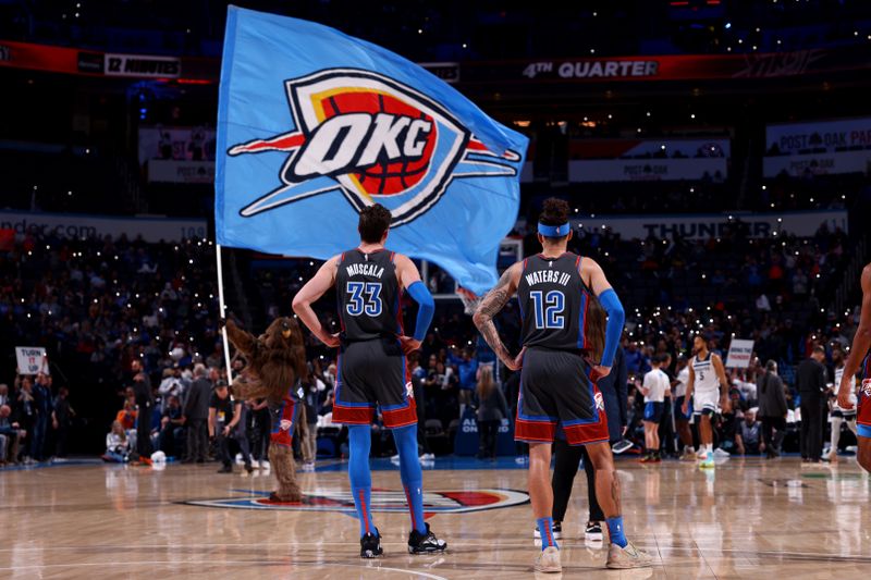 OKLAHOMA CITY, OK - DECEMBER 16: Mike Muscala #33 and Lindy Waters III #12 of the Oklahoma City Thunder look on during the game against the Minnesota Timberwolves on December 16, 2022 at Paycom Arena in Oklahoma City, Oklahoma. NOTE TO USER: User expressly acknowledges and agrees that, by downloading and or using this photograph, User is consenting to the terms and conditions of the Getty Images License Agreement. Mandatory Copyright Notice: Copyright 2022 NBAE (Photo by Zach Beeker/NBAE via Getty Images)