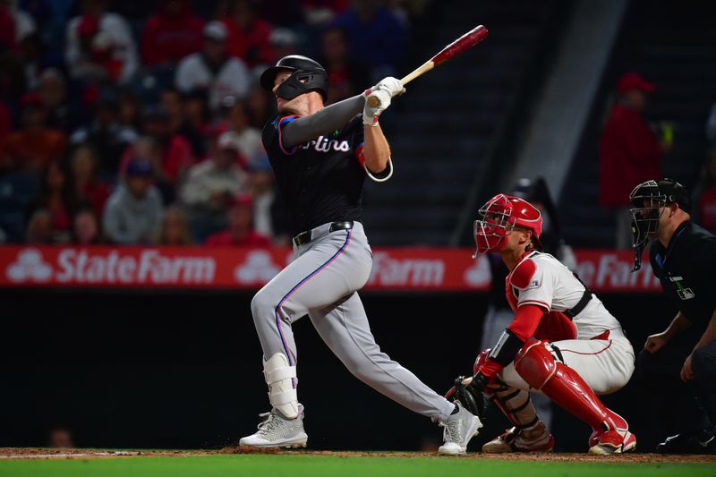 May 24, 2025; Anaheim, California, USA; Miami Marlins left fielder Eric Wagaman (33) hits an RBI single against the Los Angeles Angels during the fifth inning at Angel Stadium. Mandatory Credit: Gary A. Vasquez-Imagn Images