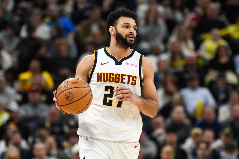 SALT LAKE CITY, UTAH - APRIL 09: Jamal Murray #27 of the Denver Nuggets brings the ball up court in the second half against the Utah Jazz at Delta Center on April 09, 2024 in Salt Lake City, Utah. NOTE TO USER: User expressly acknowledges and agrees that, by downloading and or using this photograph, User is consenting to the terms and conditions of the Getty Images License Agreement.  (Photo by Alex Goodlett/Getty Images)