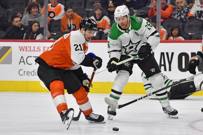 Jan 18, 2024; Philadelphia, Pennsylvania, USA; Philadelphia Flyers center Scott Laughton (21) and Dallas Stars center Joe Pavelski (16) battle for the puck during the second period at Wells Fargo Center. Mandatory Credit: Eric Hartline-USA TODAY Sports