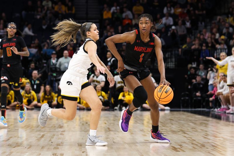 Mar 4, 2023; Minneapolis, MINN, USA; Maryland Terrapins guard Diamond Miller (1) dribbles while Iowa Hawkeyes guard Gabbie Marshall (24) defends during the second half at Target Center. Mandatory Credit: Matt Krohn-USA TODAY Sports