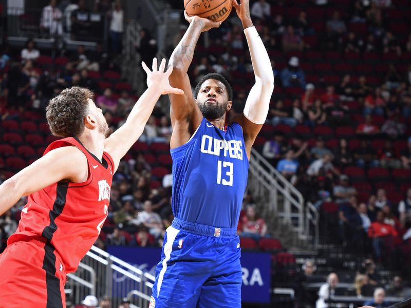 HOUSTON, TX - MARCH 6: Paul George #13 of the LA Clippers three point basket during the game against the Houston Rockets on March 6, 2024 at the Toyota Center in Houston, Texas. NOTE TO USER: User expressly acknowledges and agrees that, by downloading and or using this photograph, User is consenting to the terms and conditions of the Getty Images License Agreement. Mandatory Copyright Notice: Copyright 2024 NBAE (Photo by Logan Riely/NBAE via Getty Images)