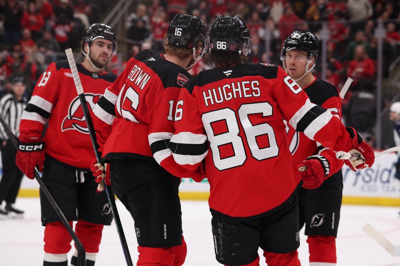 Jan 27, 2026; Newark, New Jersey, USA; New Jersey Devils left wing Jesper Bratt (63) celebrates his goal against the Winnipeg Jets during the second period at Prudential Center. Mandatory Credit: Ed Mulholland-Imagn Images