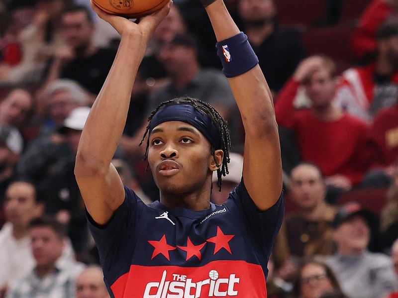 CHICAGO, ILLINOIS - JANUARY 10: Bilal Coulibaly #0 of the Washington Wizards shoots a three pointer against the Chicago Bulls during the first half at the United Center on January 10, 2025 in Chicago, Illinois. NOTE TO USER: User expressly acknowledges and agrees that, by downloading and or using this photograph, User is consenting to the terms and conditions of the Getty Images License Agreement.  (Photo by Michael Reaves/Getty Images)