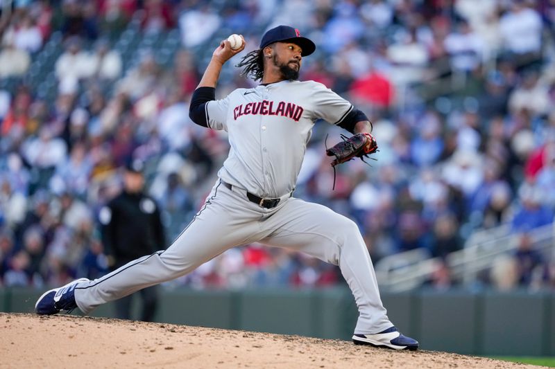 Apr 4, 2024; Minneapolis, Minnesota, USA; Cleveland Guardians relief pitcher Emmanuel Clase (48) delivers a pitch during the ninth inning against the Minnesota Twins at Target Field. Mandatory Credit: Jordan Johnson-USA TODAY Sports